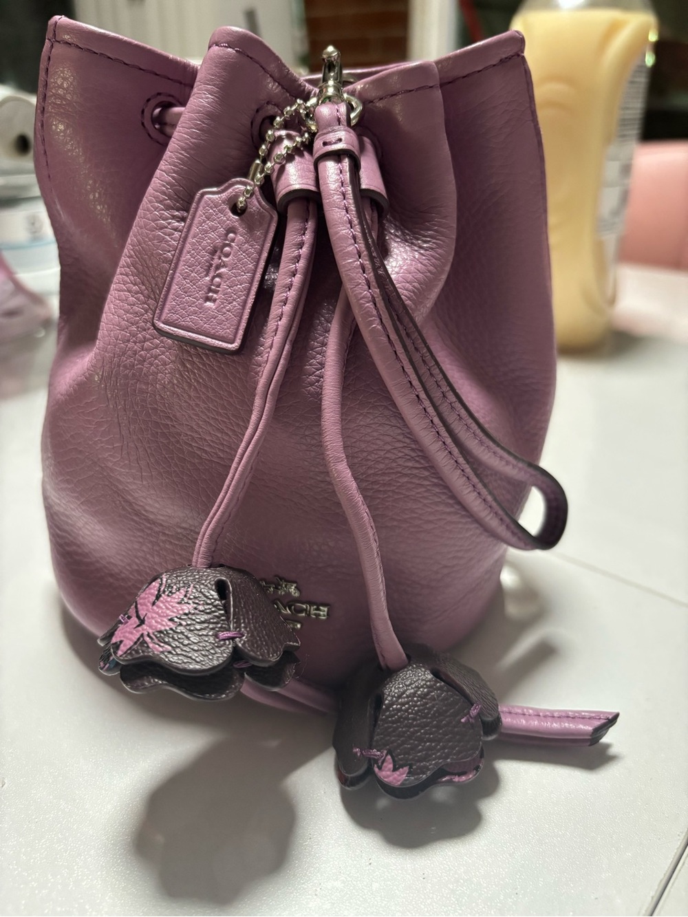 Coach Lilac Pebble Leather Drawstring Mini Bucket Bag